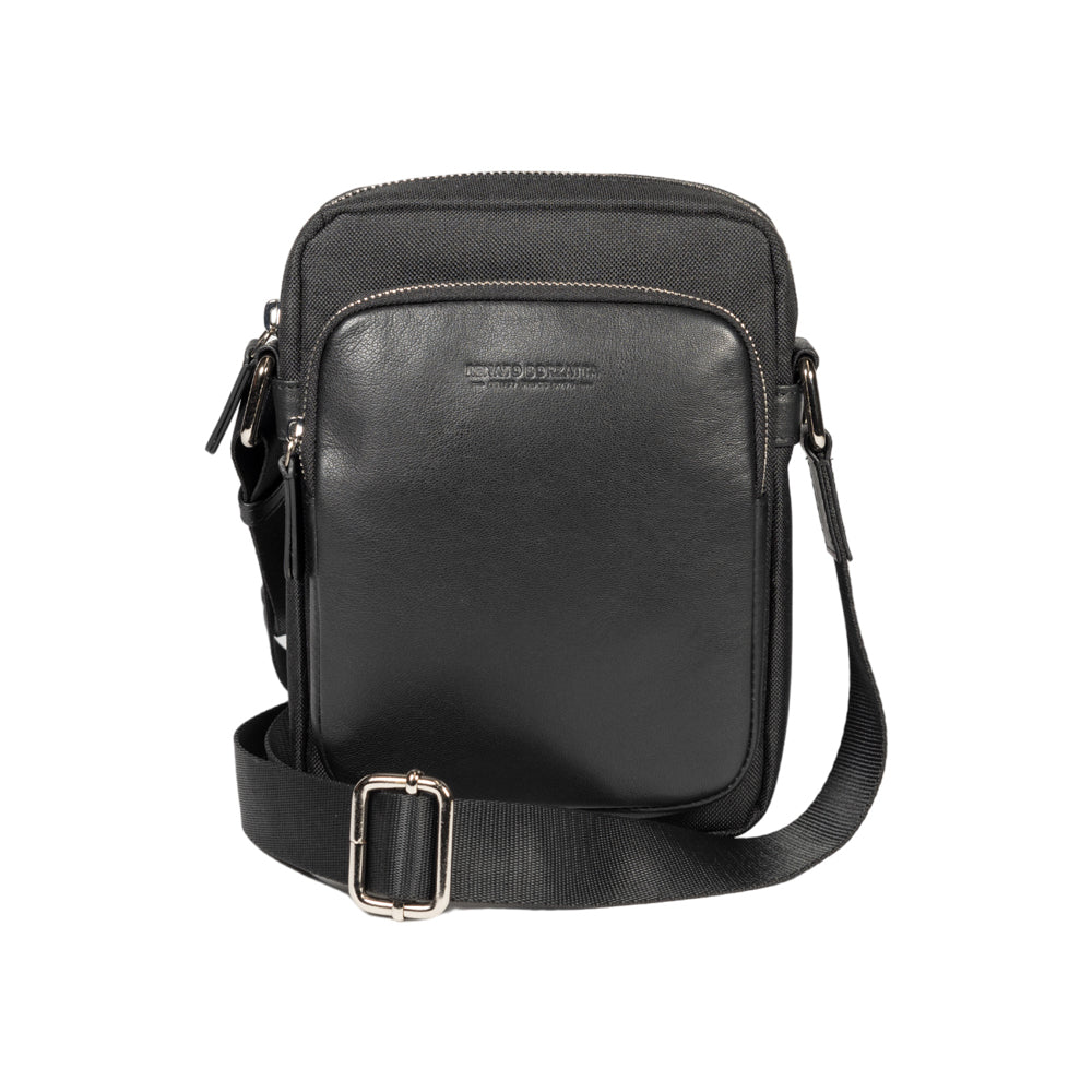 RB2002A | Nylon/Genuine Leather Shoulder Bag with a light grain. Zip closure and adjustable shoulder strap. Color: Black. Dimensions: 15.5 x 21 x 7 cm. Packaging: Non-woven fabric bag.-1